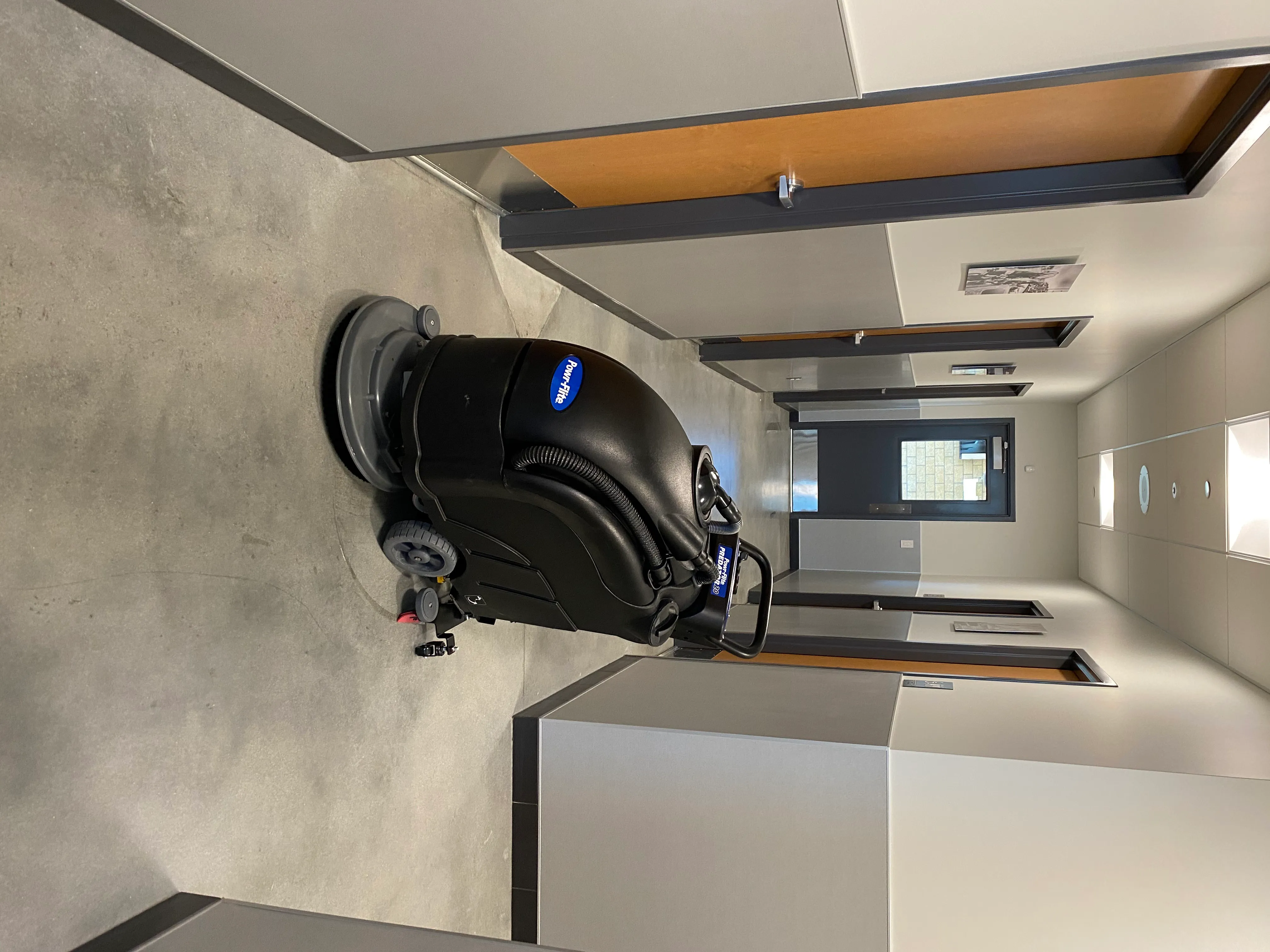 Powr-Flite walk-behind scrubber serviced by Advance Cleaning Equipment technicians